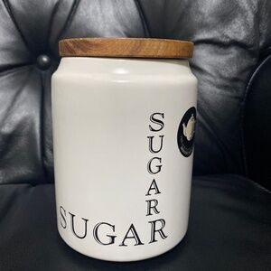 Sugar container jar the old pottery company made in England wooden lid